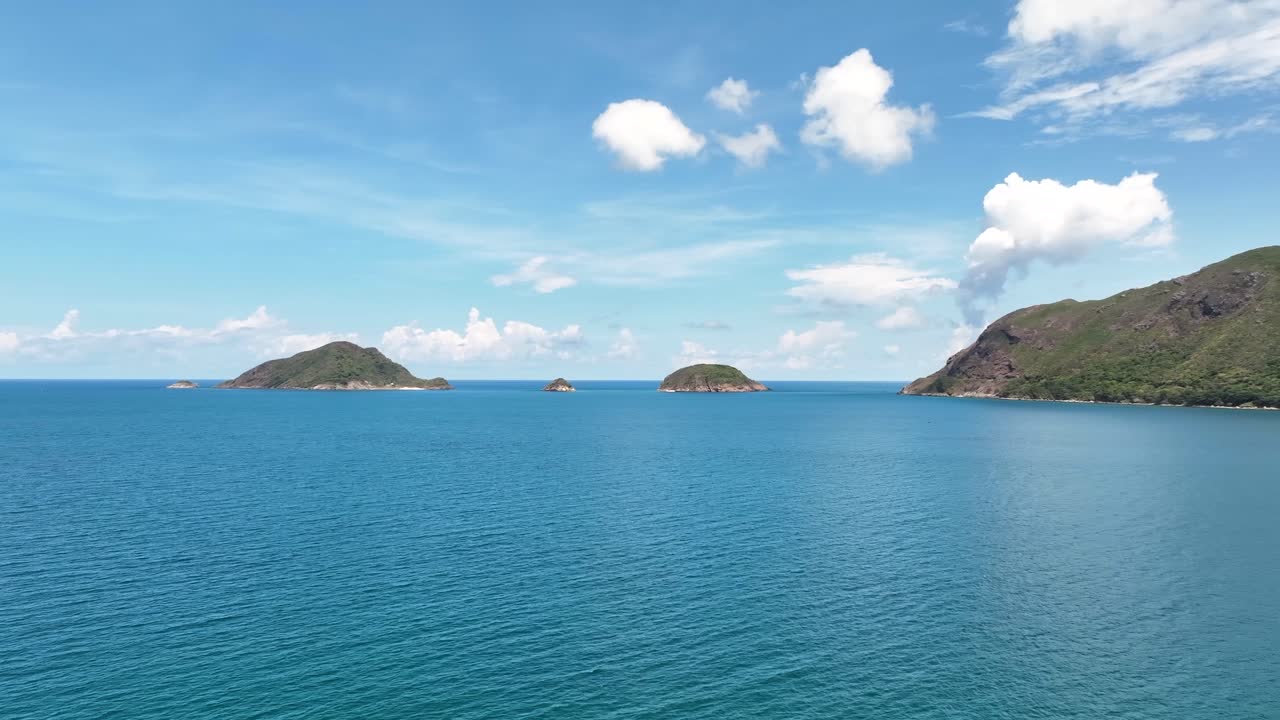 Gentle waves in endless flow, caressing island shores with soft hello