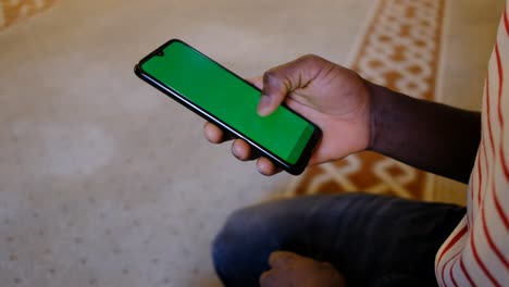african man hands chrome key phone