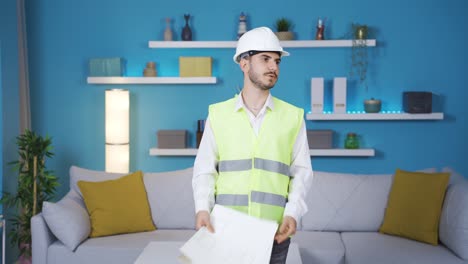 un joven ingeniero estresado y abrumado.