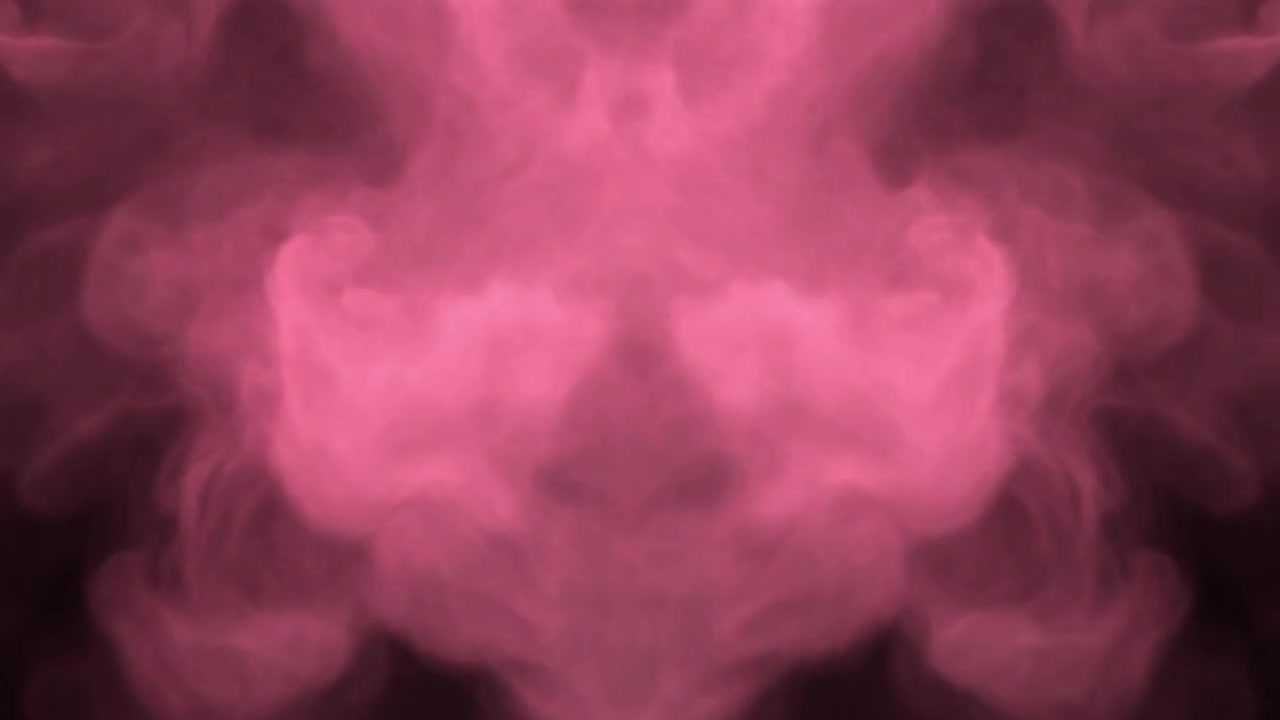Fumo rosa che si innalza su sfondo scuro
