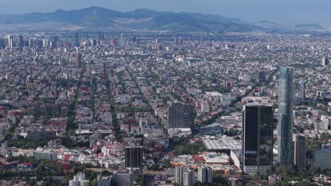 aerial drone footage of mexico city on a clear and detailed afternoon