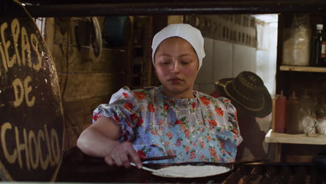 woman cooking latin food