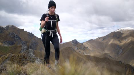 girl hiking through the mountains on an epic adventure