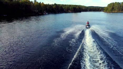 Aerial-shot-of-someone-on-a-jetski