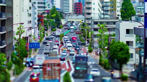 a timelapse of the miniature traffic jam at the urban street in tokyo