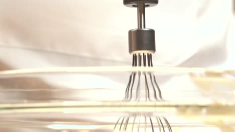 cook adding sugar to cake mix