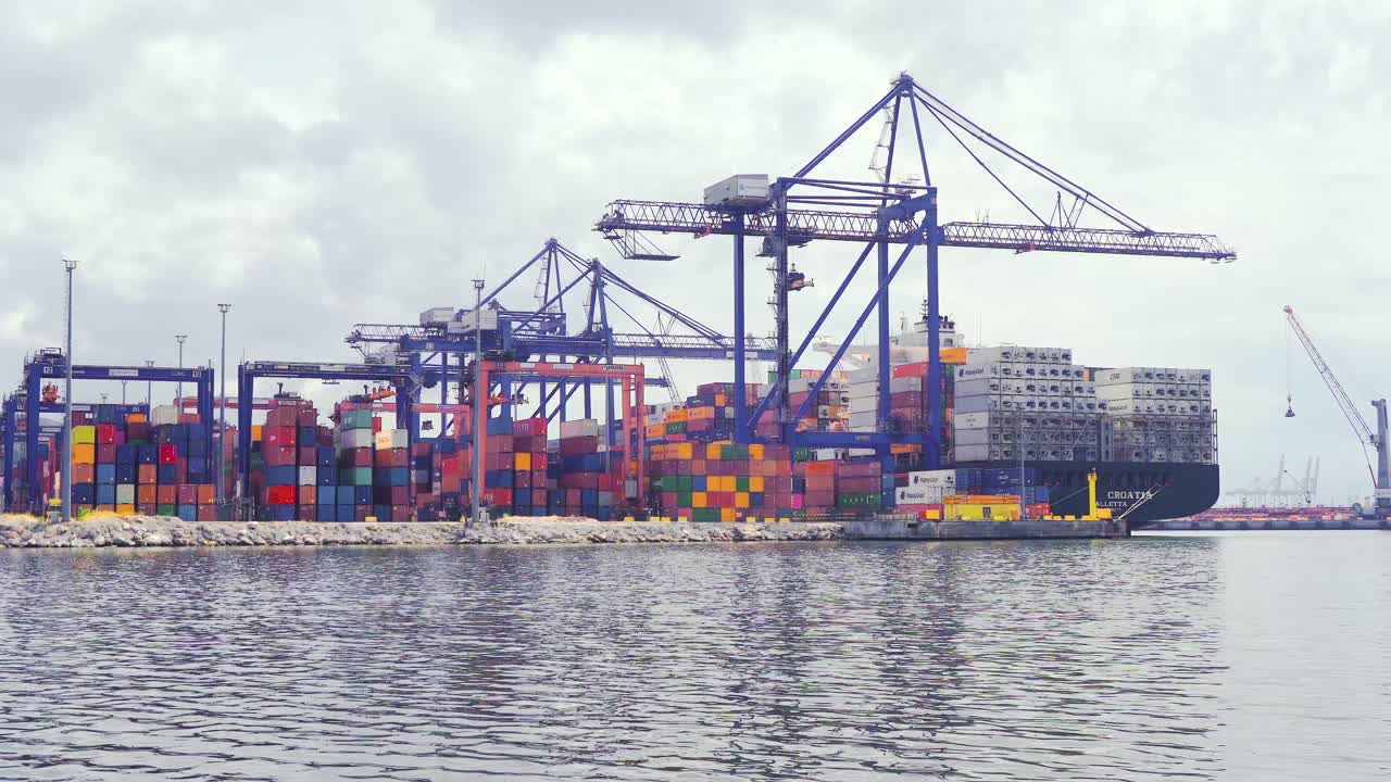 Shipping containers in industrial port.