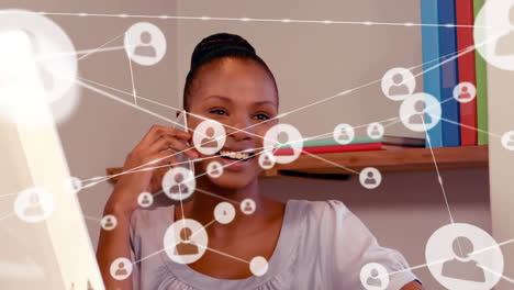 Animation-of-network-of-connections-over-biracial-woman-talking-on-smartphone