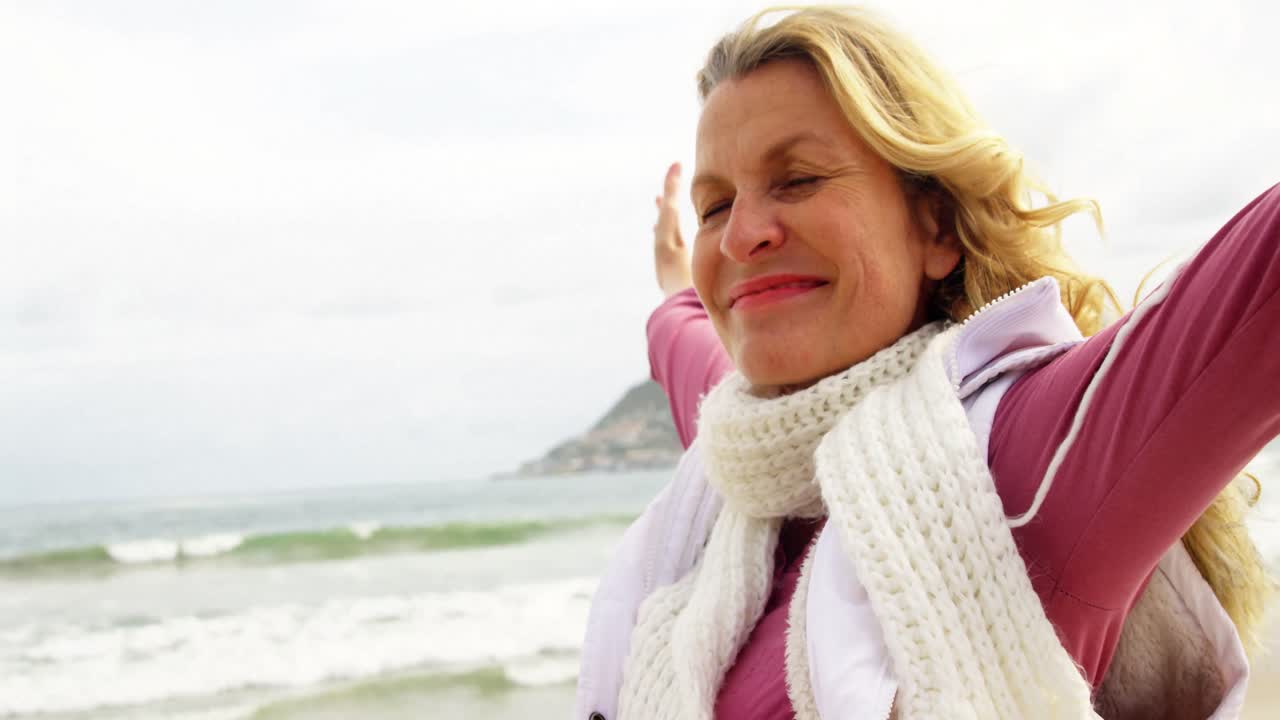 Beautiful woman enjoying on beach