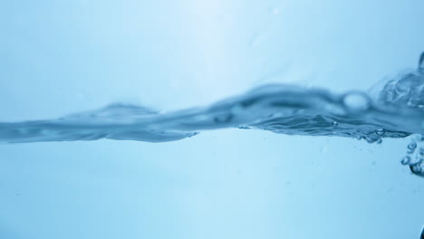 Engaging visuals of flowing water, capturing the essence of blue waves that symbolize purity and refreshing hydration.