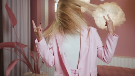 young girl moving her head with the music