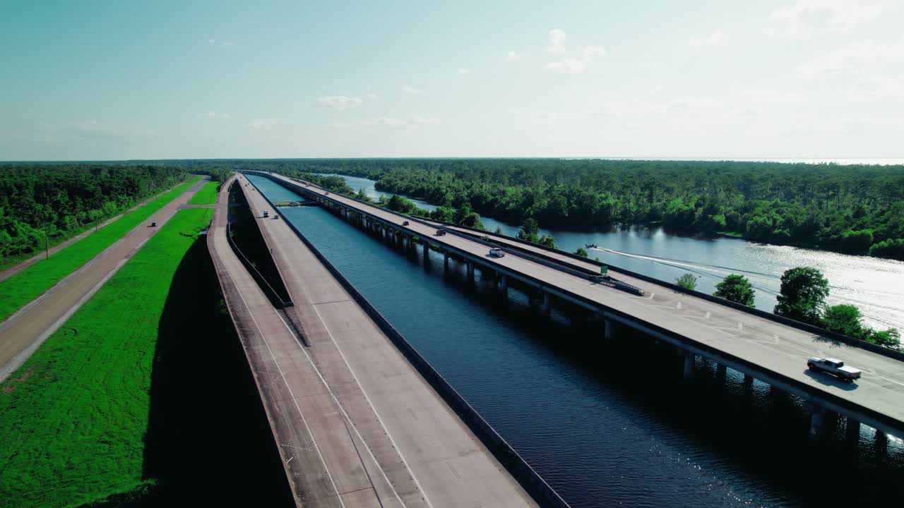 Boat gliding through Maurepas Swamp near LaPlace, Louisiana—perfect for environmental and nature documentaries.