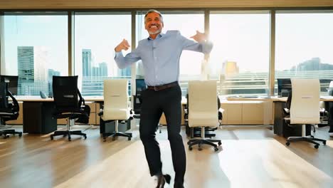 a businessman celebrating success in his office