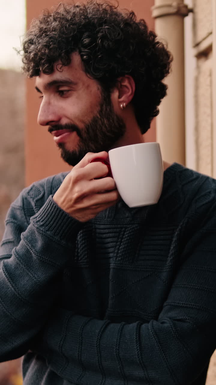 Gay Couple Enjoys Morning Coffee at Home