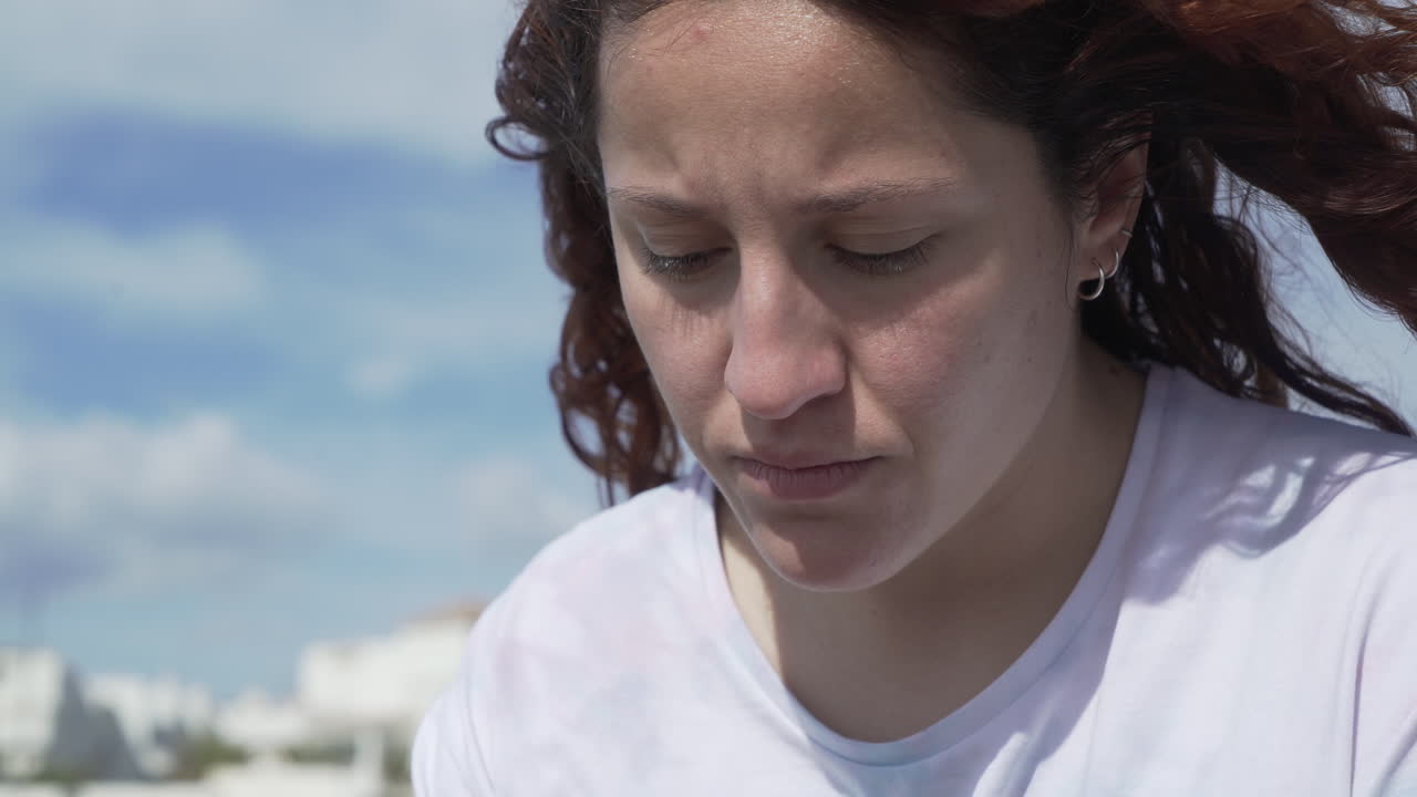 Young Woman With Phone On Beach
