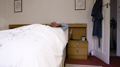 an elderly man in his bedroom