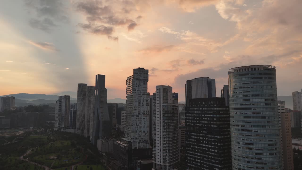 Drone footage of a sunset over Santa Fe, Mexico City