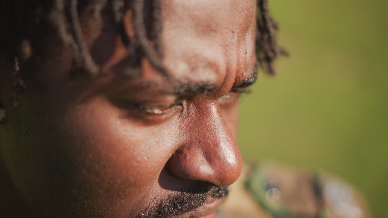 Military Operative Scans Area Carefully, Man In Camouflage Meticulously Examining Perimeter For Threats, Close Examination By Armed Soldier In Tactical Gear Watching For Potential Dangers Nearby