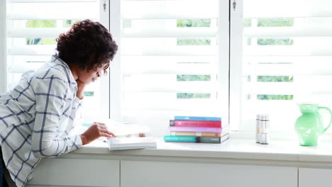 woman reading a novel 4k