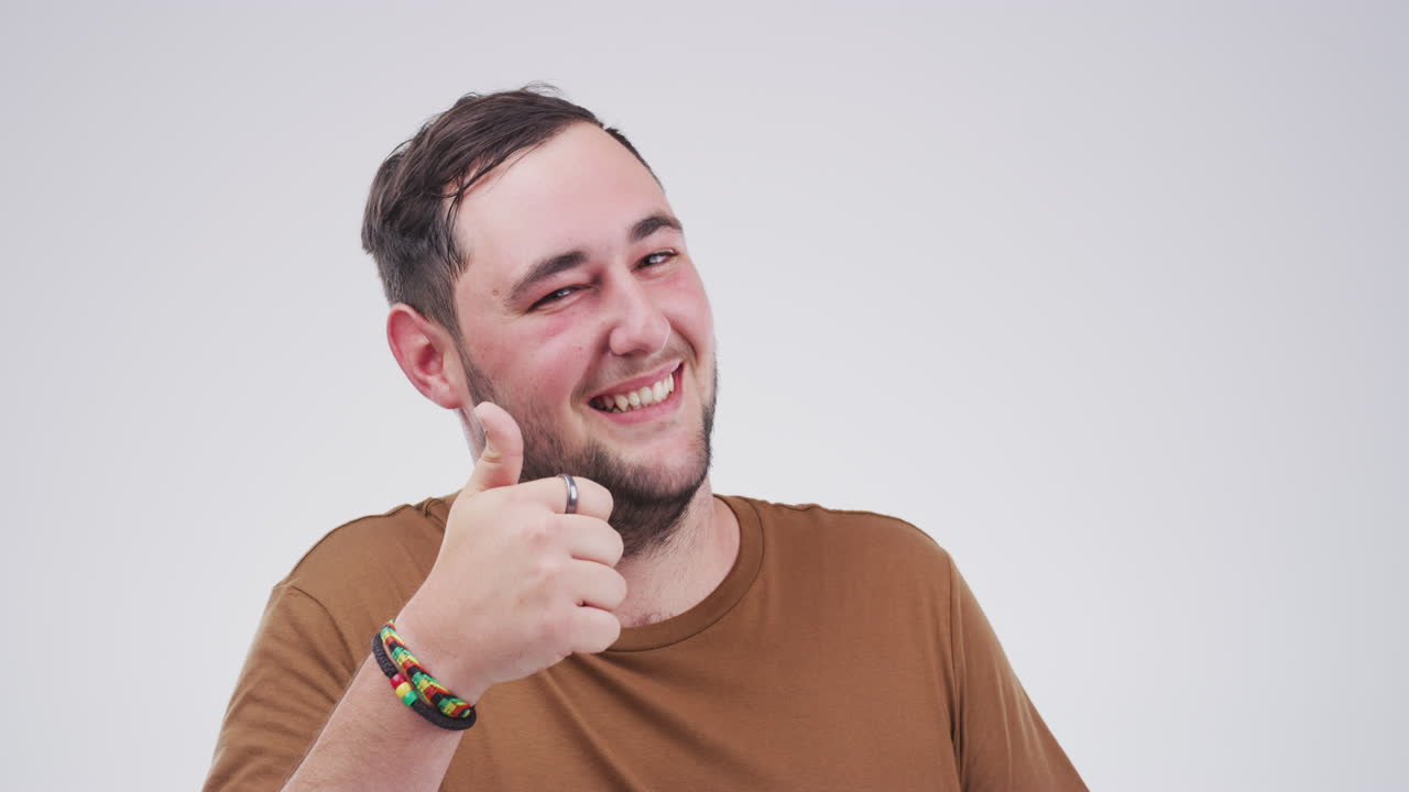 prendi un pollice in su.