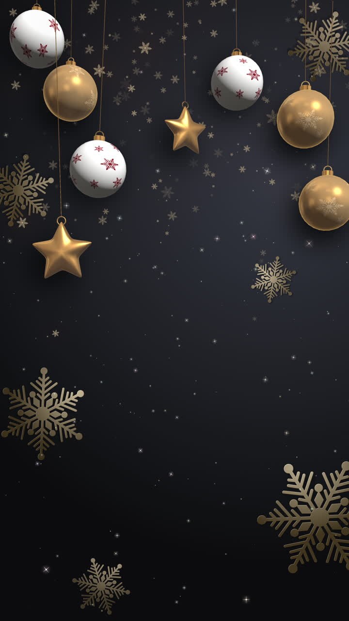 Christmas golden decoration on black background. Stars, snowflakes and balls on threads. Looped animation. Copy space. Vertical video.