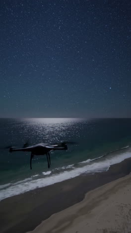 Drone at Night Over the Ocean Beach