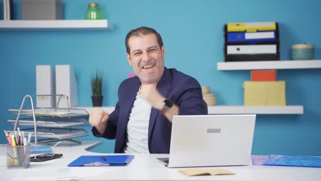 happy and cheerful talking businessman looking at camera.