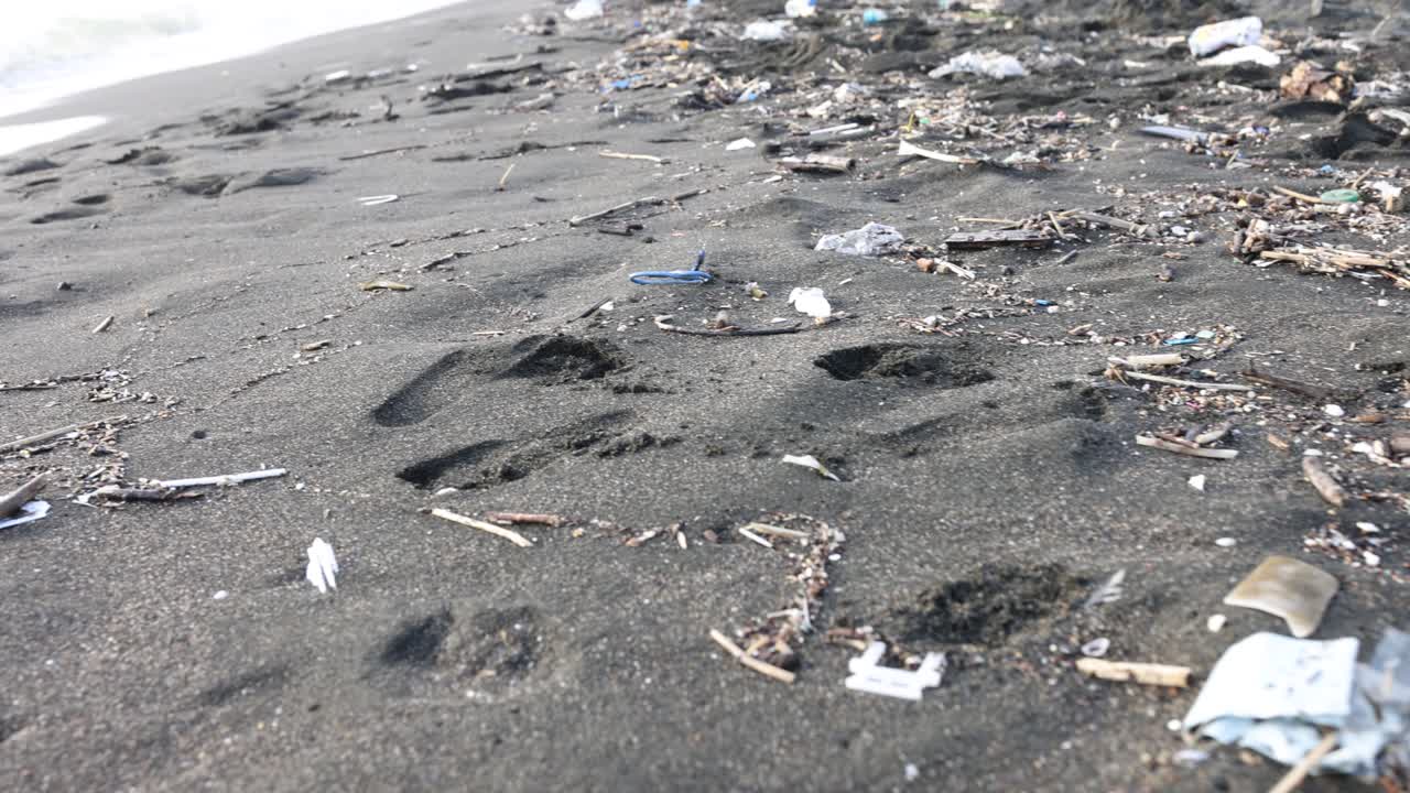 Polluted Beach with Footprints
