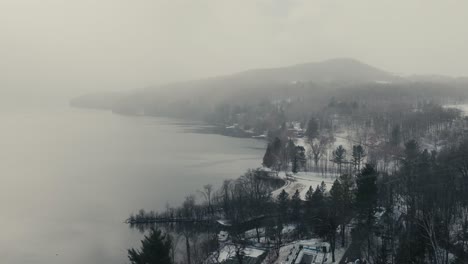 gloomy weather over lake massawippi near manoir hovey hotel in north hatley, québec canada