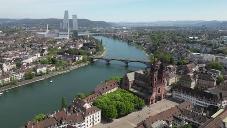 rhine river in basel, switzerland, aerial drone establish shot in europe