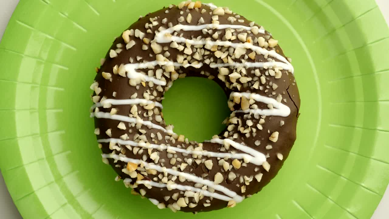 el donut está vidriado de cerca, con un bucle sin costuras.