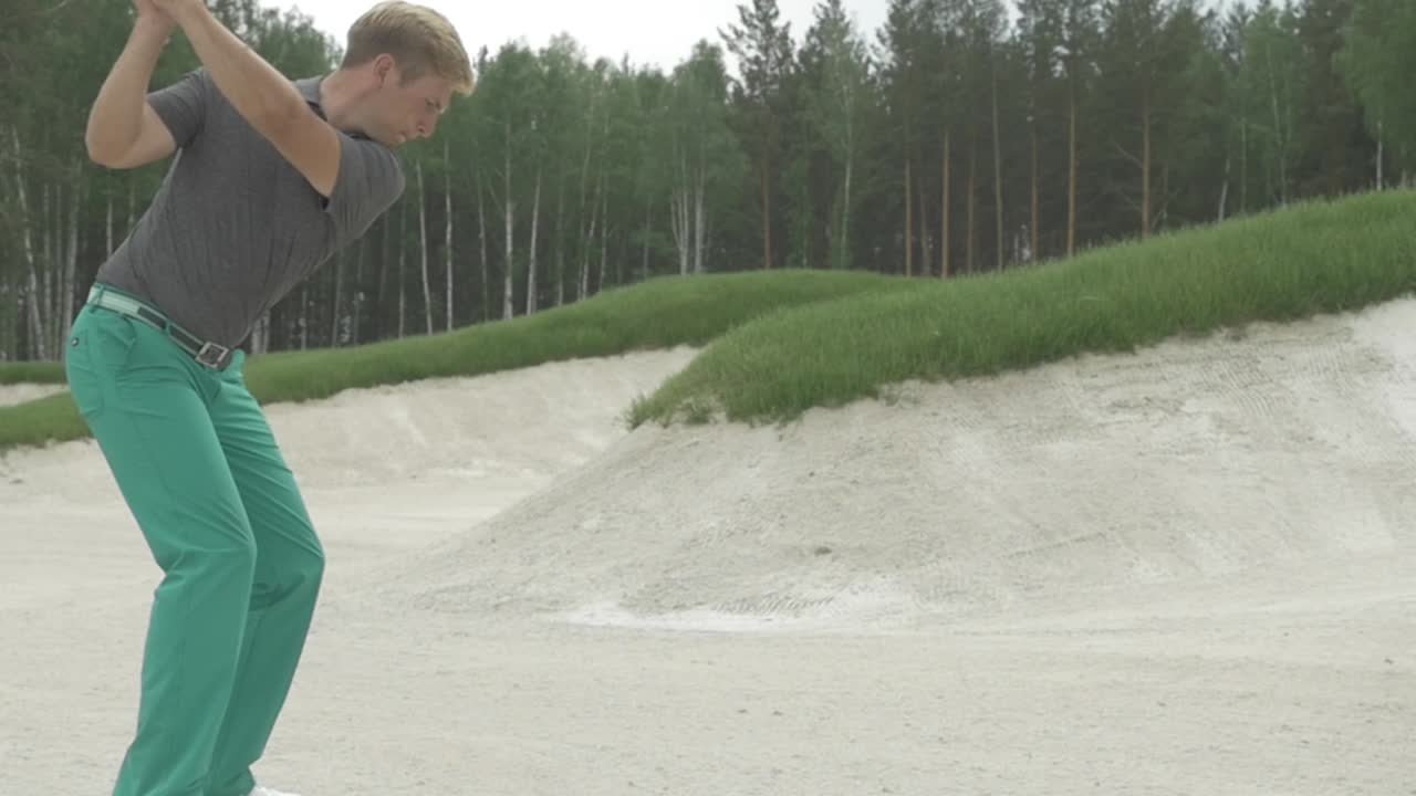 Golf Player in Sand Trap
