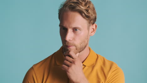 young bearded man thinking