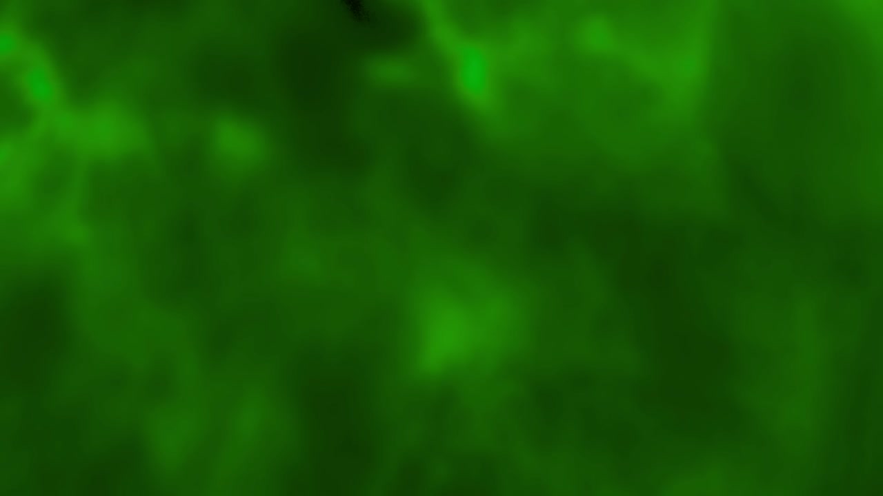 dos nubes de tinta verde en el agua