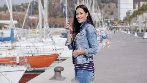 attractive casual young woman standing laughing