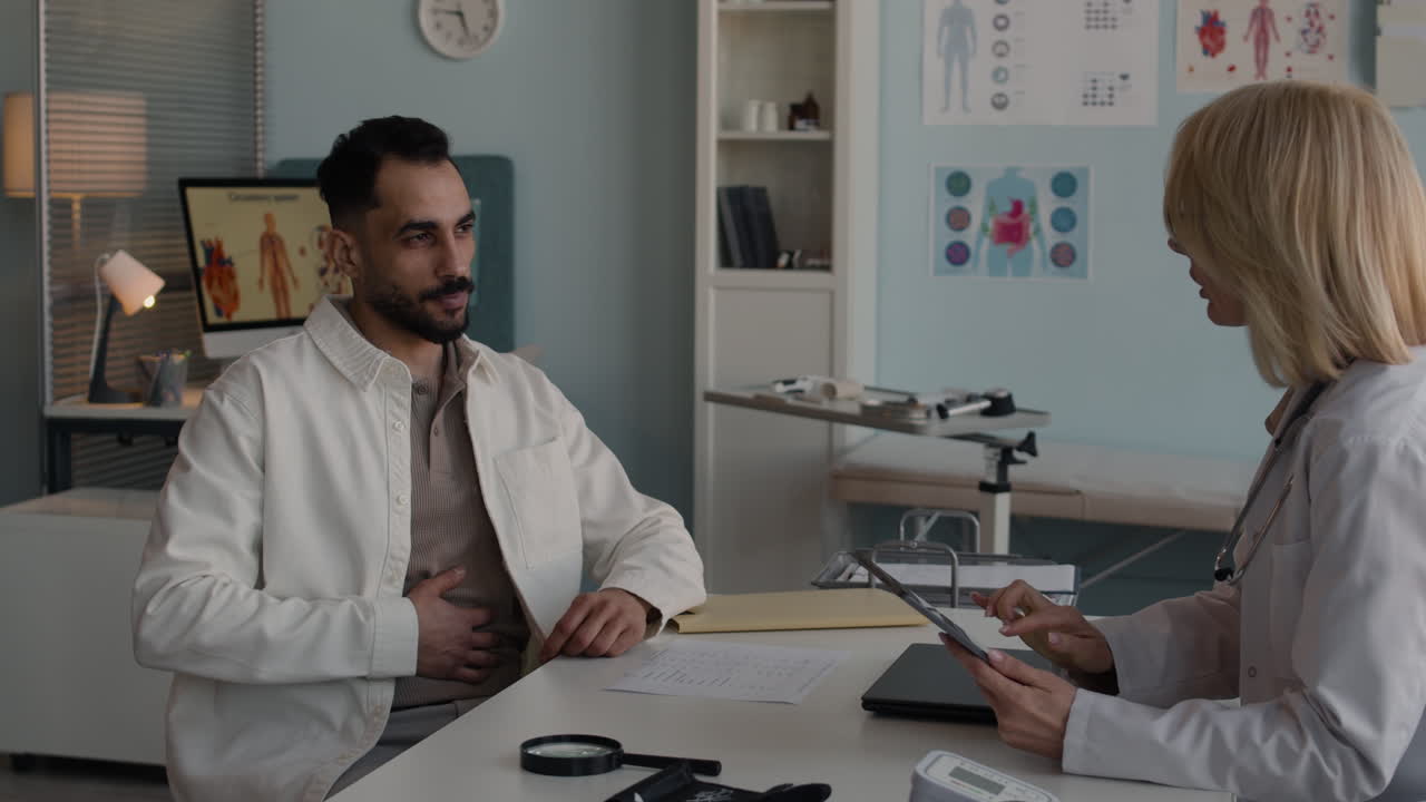 Doctor consulting with patient in clinic