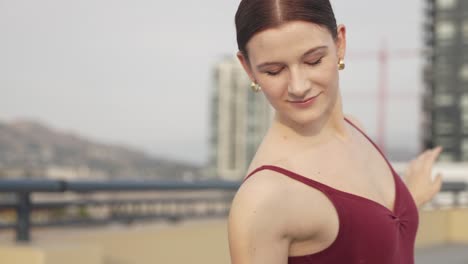 peaceful ballet girl dancing on a parkade roof