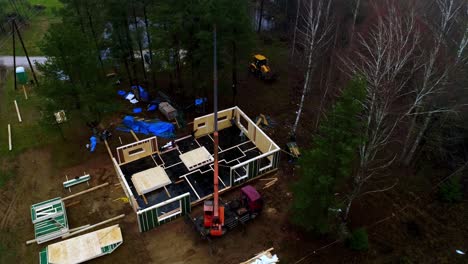 modular home house building site workplace under construction frame assembly, aerial view