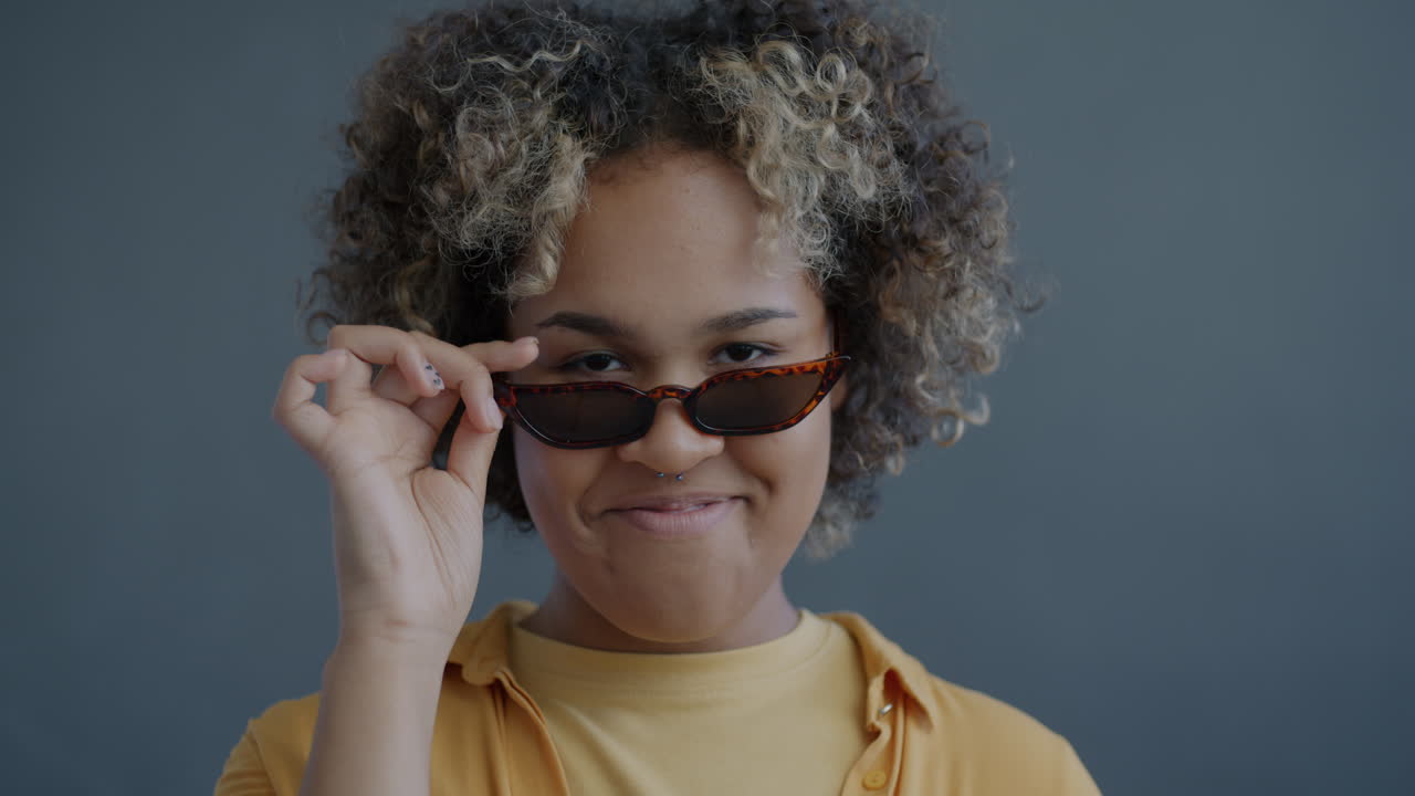 Young Woman Wearing Sunglasses