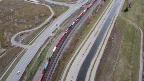 canadian pacific railway train on rails in calgary, alberta