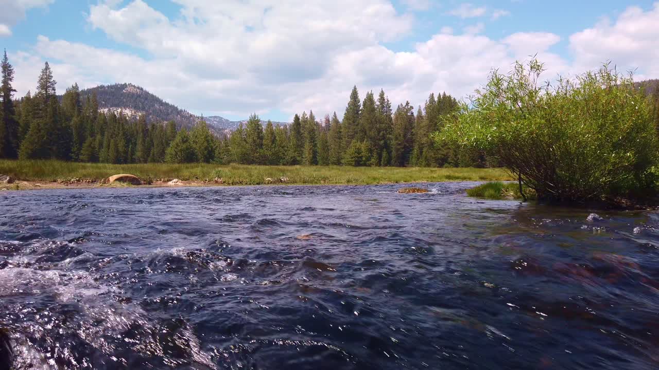 Gimbal static shot of a fast-flowing mountain stream in Mammoth Lakes, California