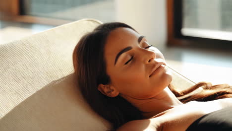 woman relaxing in a sunbeam