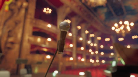 close-up of a microphone on a stage in a theater