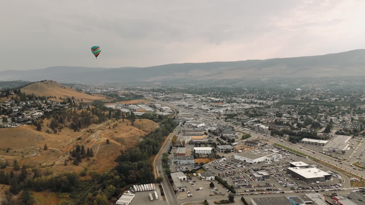 Explore 4K aerial footage of Kelowna’s downtown development and economic growth, capturing urban expansion, infrastructure, and vibrant city life.