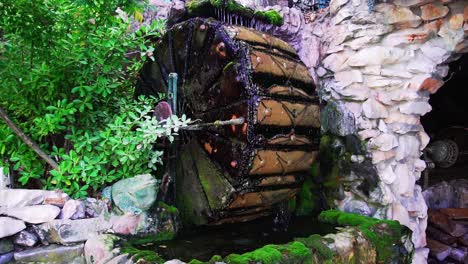 water wheel turning with dripping water