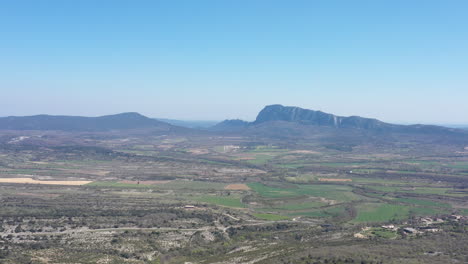 Pic-Saint-Loup-aerial-shot-from-the-distance-sunny-day-blue-sky