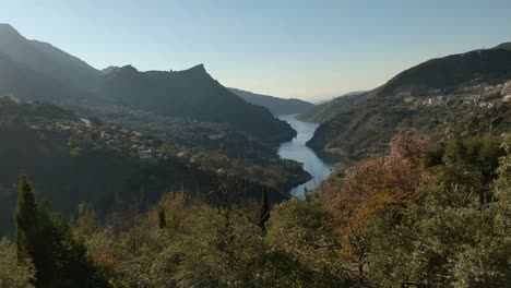 tilt view over hills and lake near güéjar sierra, spain