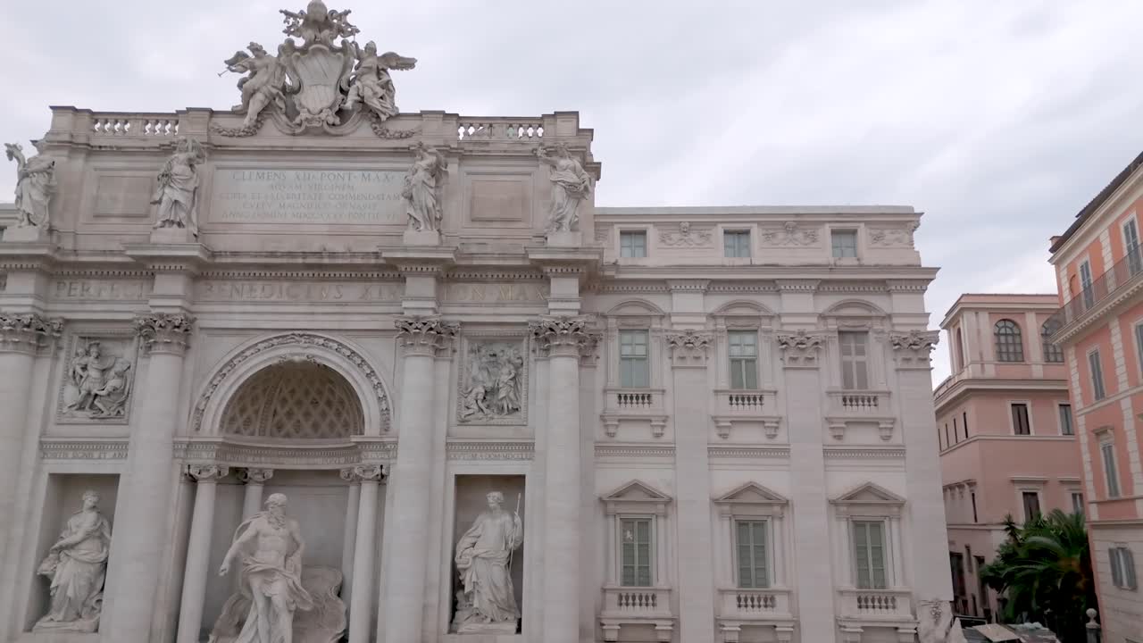 Aerial view of the iconic Trevi Fountain in Rome, Italy, captured during early morning light