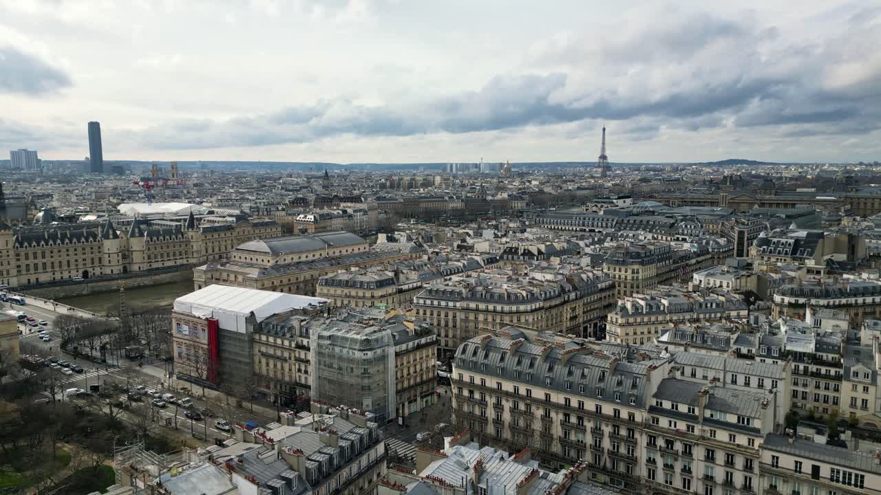 Boulevard de Sebastopol with Saint-Jacques Tower in foreground and Tour Eiffel in background, Paris in France