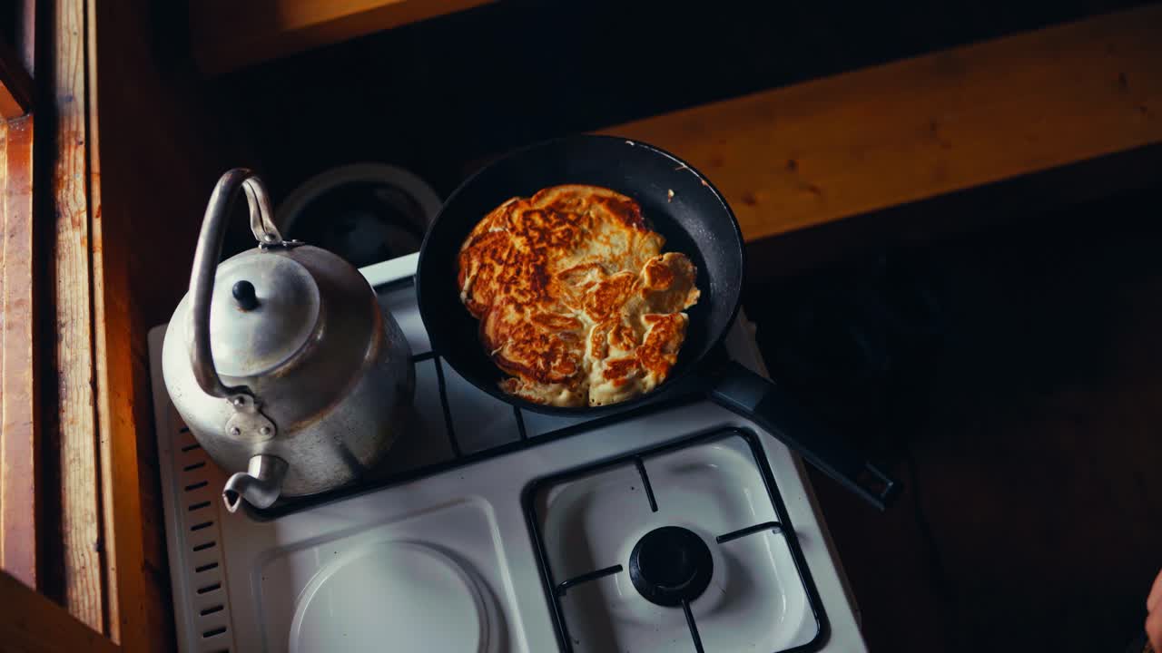 Unrecognizable Man Cooking Breakfast At Home. High Angle Shot